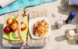 Food and drinks basket on beach