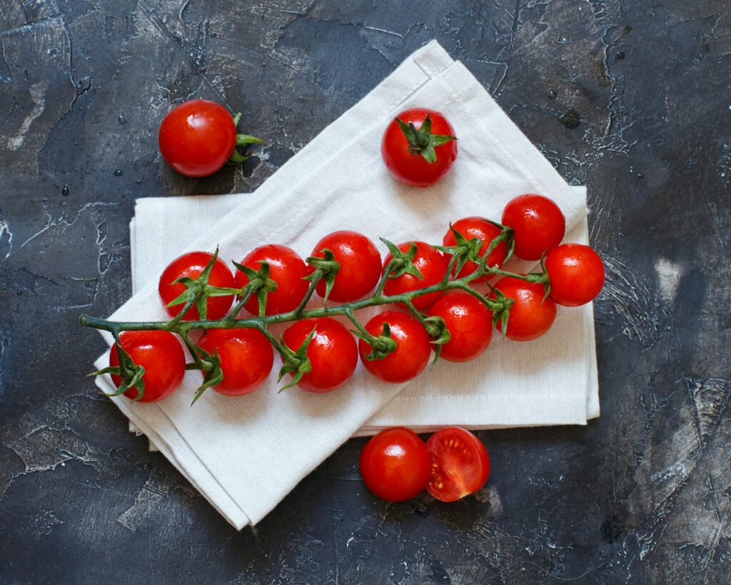 Cherry tomatoes on a dark background