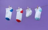 Premature baby day concept. Tiny socks
